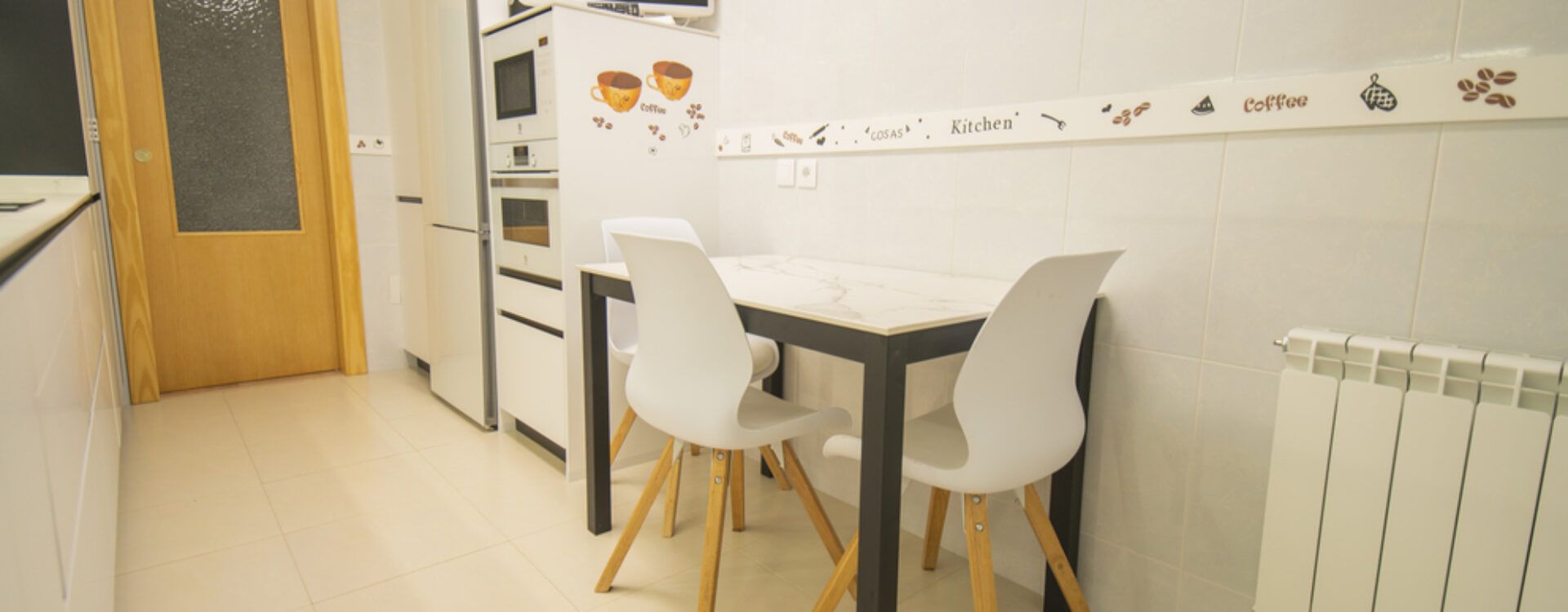 Cocina blanca en dos frentes. Cocinas Suarco