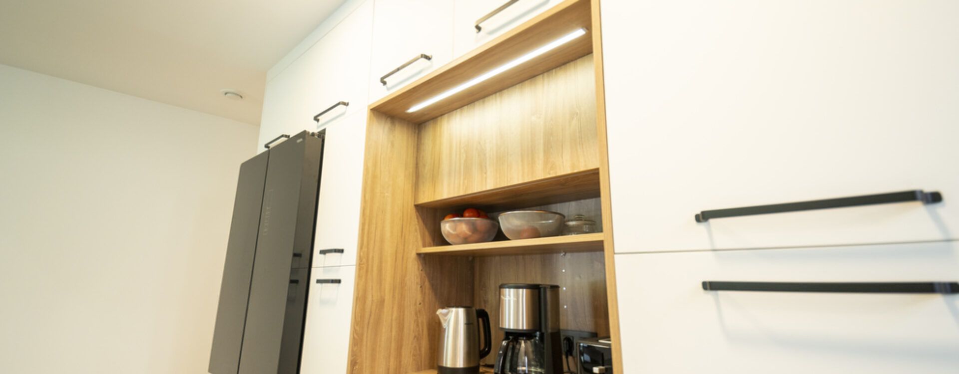 Cocina abierta al salón con isla. Cocinas Suarco